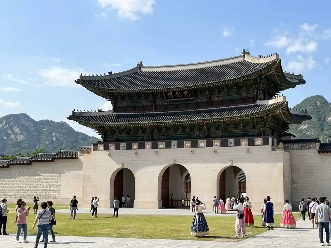 Gwanghwamun Gate at Gyeongbokgung Palace under a blue sky